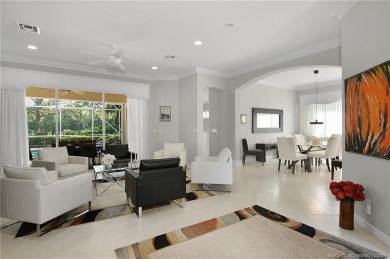 Awaken to golden sunrises glimmering across the lake and on  in Florida - for sale on GolfHomes.com, golf home, golf lot
