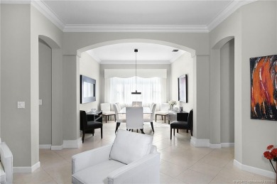 Awaken to golden sunrises glimmering across the lake and on  in Florida - for sale on GolfHomes.com, golf home, golf lot
