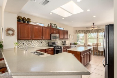 Experience resort-style living in Sun City Grand, Surprise's on Cimarron Golf Club in Arizona - for sale on GolfHomes.com, golf home, golf lot