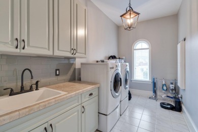 This stunning 5-bedroom, 3.5-bath home in the gated community of on Golden Eagle Country Club in Florida - for sale on GolfHomes.com, golf home, golf lot