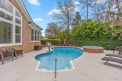This stunning 5-bedroom, 3.5-bath home in the gated community of on Golden Eagle Country Club in Florida - for sale on GolfHomes.com, golf home, golf lot