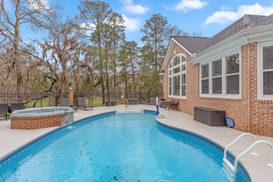 This stunning 5-bedroom, 3.5-bath home in the gated community of on Golden Eagle Country Club in Florida - for sale on GolfHomes.com, golf home, golf lot