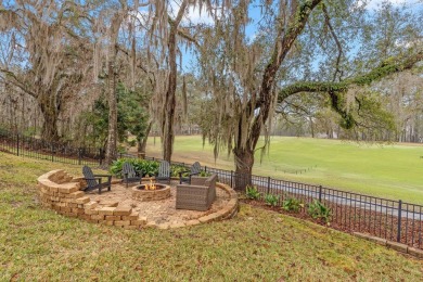 This stunning 5-bedroom, 3.5-bath home in the gated community of on Golden Eagle Country Club in Florida - for sale on GolfHomes.com, golf home, golf lot
