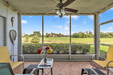 Beautiful first-floor corner unit overlooking the golf course in on Palm-Aire Country Club and Resort - Palms in Florida - for sale on GolfHomes.com, golf home, golf lot