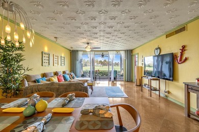 Beautiful first-floor corner unit overlooking the golf course in on Palm-Aire Country Club and Resort - Palms in Florida - for sale on GolfHomes.com, golf home, golf lot