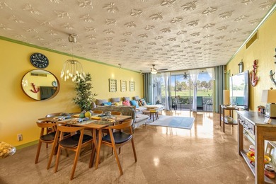 Beautiful first-floor corner unit overlooking the golf course in on Palm-Aire Country Club and Resort - Palms in Florida - for sale on GolfHomes.com, golf home, golf lot