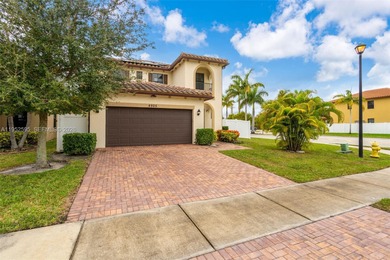 Gorgeous two-story single-family home built in 2019, located in on Woodlands Country Club in Florida - for sale on GolfHomes.com, golf home, golf lot