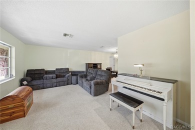 Located in the desirable Oak Village of Sugarmill Woods, this on Sugarmill Woods Golf and Country Club in Florida - for sale on GolfHomes.com, golf home, golf lot