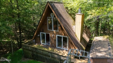 Classic Pocono Lake chalet with endless potential! This on The Hideout Golf in Pennsylvania - for sale on GolfHomes.com, golf home, golf lot