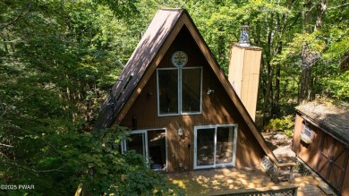 Classic Pocono Lake chalet with endless potential! This on The Hideout Golf in Pennsylvania - for sale on GolfHomes.com, golf home, golf lot