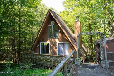Classic Pocono Lake chalet with endless potential! This on The Hideout Golf in Pennsylvania - for sale on GolfHomes.com, golf home, golf lot