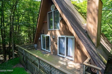 Classic Pocono Lake chalet with endless potential! This on The Hideout Golf in Pennsylvania - for sale on GolfHomes.com, golf home, golf lot