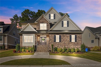 Welcome to this stunning executive-style custom home offering 5 on Kings Grant Golf and Country Club in North Carolina - for sale on GolfHomes.com, golf home, golf lot