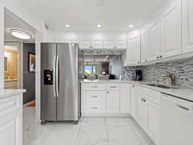 Welcome to a stunning corner Unit 2 bedrooms and 2 bathrooms on Oriole Golf and Tennis Club in Florida - for sale on GolfHomes.com, golf home, golf lot