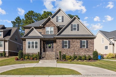 Welcome to this stunning executive-style custom home offering 5 on Kings Grant Golf and Country Club in North Carolina - for sale on GolfHomes.com, golf home, golf lot