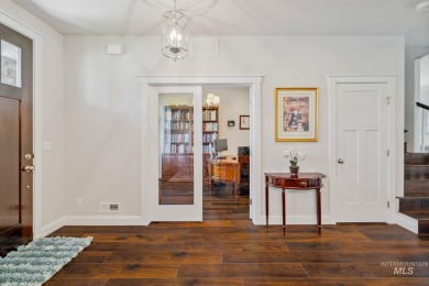 This stunning, custom-built home features both a primary and on Hunters Point Golf Club in Idaho - for sale on GolfHomes.com, golf home, golf lot