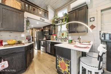 This tiny home may be small in size, but it's big on charm and on Laurel Valley Golf Course in Tennessee - for sale on GolfHomes.com, golf home, golf lot