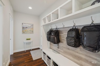 This stunning, custom-built home features both a primary and on Hunters Point Golf Club in Idaho - for sale on GolfHomes.com, golf home, golf lot