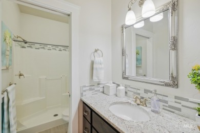 This stunning, custom-built home features both a primary and on Hunters Point Golf Club in Idaho - for sale on GolfHomes.com, golf home, golf lot