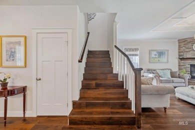 This stunning, custom-built home features both a primary and on Hunters Point Golf Club in Idaho - for sale on GolfHomes.com, golf home, golf lot