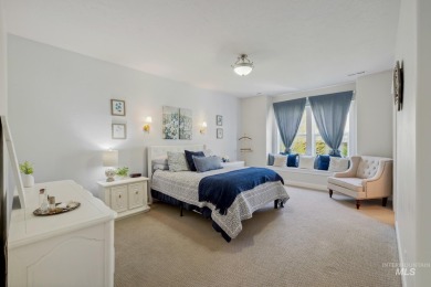 This stunning, custom-built home features both a primary and on Hunters Point Golf Club in Idaho - for sale on GolfHomes.com, golf home, golf lot