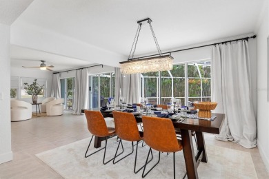 Step inside this beautifully updated coastal retreat and on Saint Andrews South Golf Club in Florida - for sale on GolfHomes.com, golf home, golf lot