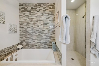 This stunning, custom-built home features both a primary and on Hunters Point Golf Club in Idaho - for sale on GolfHomes.com, golf home, golf lot