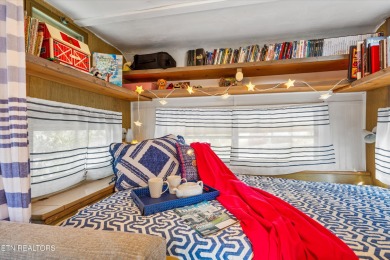 This tiny home may be small in size, but it's big on charm and on Laurel Valley Golf Course in Tennessee - for sale on GolfHomes.com, golf home, golf lot