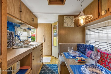 This tiny home may be small in size, but it's big on charm and on Laurel Valley Golf Course in Tennessee - for sale on GolfHomes.com, golf home, golf lot