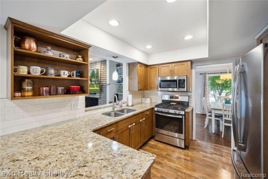 This charming ranch that's move-in ready  packed with features on Maple Lane Golf Club in Michigan - for sale on GolfHomes.com, golf home, golf lot