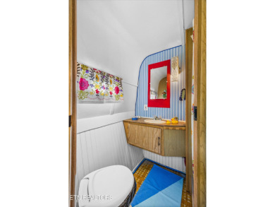 This tiny home may be small in size, but it's big on charm and on Laurel Valley Golf Course in Tennessee - for sale on GolfHomes.com, golf home, golf lot