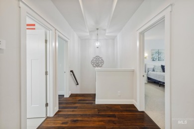 This stunning, custom-built home features both a primary and on Hunters Point Golf Club in Idaho - for sale on GolfHomes.com, golf home, golf lot