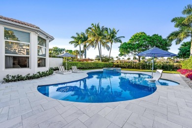 This tranquil retreat nestled within The Country Club at Mirasol on Country Club At Mirasol in Florida - for sale on GolfHomes.com, golf home, golf lot