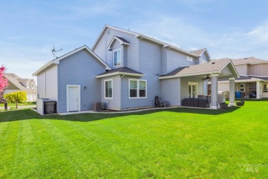 This stunning, custom-built home features both a primary and on Hunters Point Golf Club in Idaho - for sale on GolfHomes.com, golf home, golf lot