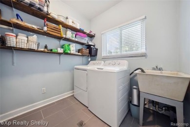 This charming ranch that's move-in ready  packed with features on Maple Lane Golf Club in Michigan - for sale on GolfHomes.com, golf home, golf lot