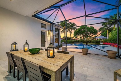 This tranquil retreat nestled within The Country Club at Mirasol on Country Club At Mirasol in Florida - for sale on GolfHomes.com, golf home, golf lot