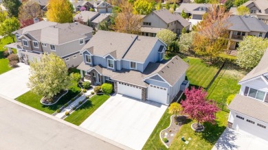 This stunning, custom-built home features both a primary and on Hunters Point Golf Club in Idaho - for sale on GolfHomes.com, golf home, golf lot