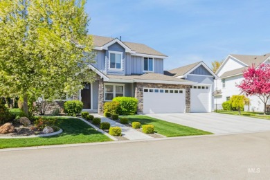 This stunning, custom-built home features both a primary and on Hunters Point Golf Club in Idaho - for sale on GolfHomes.com, golf home, golf lot
