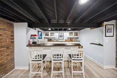 This charming ranch that's move-in ready  packed with features on Maple Lane Golf Club in Michigan - for sale on GolfHomes.com, golf home, golf lot