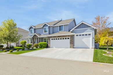 This stunning, custom-built home features both a primary and on Hunters Point Golf Club in Idaho - for sale on GolfHomes.com, golf home, golf lot