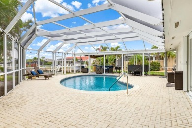 Step inside this beautifully updated coastal retreat and on Saint Andrews South Golf Club in Florida - for sale on GolfHomes.com, golf home, golf lot