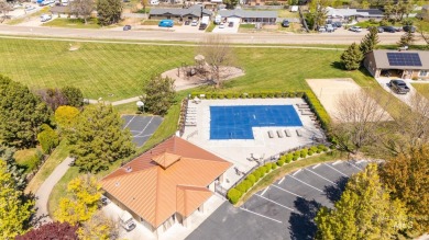 This stunning, custom-built home features both a primary and on Hunters Point Golf Club in Idaho - for sale on GolfHomes.com, golf home, golf lot