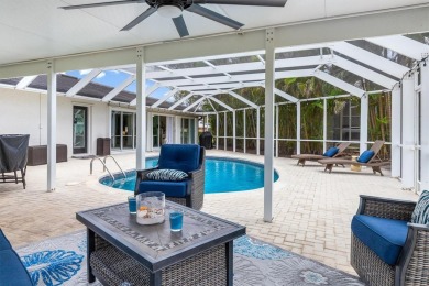 Step inside this beautifully updated coastal retreat and on Saint Andrews South Golf Club in Florida - for sale on GolfHomes.com, golf home, golf lot