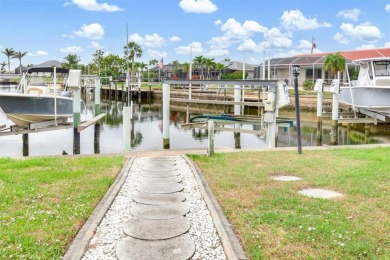 Step inside this beautifully updated coastal retreat and on Saint Andrews South Golf Club in Florida - for sale on GolfHomes.com, golf home, golf lot