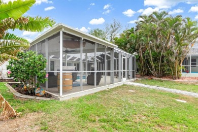 Step inside this beautifully updated coastal retreat and on Saint Andrews South Golf Club in Florida - for sale on GolfHomes.com, golf home, golf lot