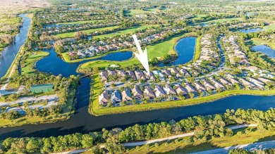 This tranquil retreat nestled within The Country Club at Mirasol on Country Club At Mirasol in Florida - for sale on GolfHomes.com, golf home, golf lot