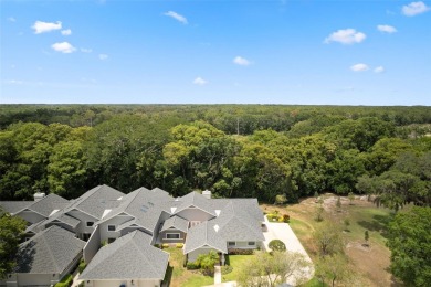 COUNTRY CLUB living at it's finest! This three bedroom villa in on Cypress Run Golf Club - Pinellas in Florida - for sale on GolfHomes.com, golf home, golf lot