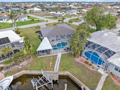 Step inside this beautifully updated coastal retreat and on Saint Andrews South Golf Club in Florida - for sale on GolfHomes.com, golf home, golf lot