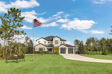 This exquisite 6 bedroom, 4.5 bath modern farmhouse sits on on Wedgefield Golf Club in Florida - for sale on GolfHomes.com, golf home, golf lot