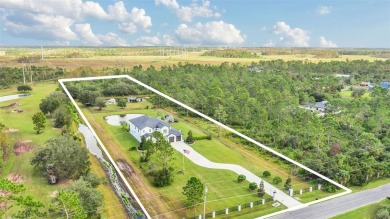 This exquisite 6 bedroom, 4.5 bath modern farmhouse sits on on Wedgefield Golf Club in Florida - for sale on GolfHomes.com, golf home, golf lot